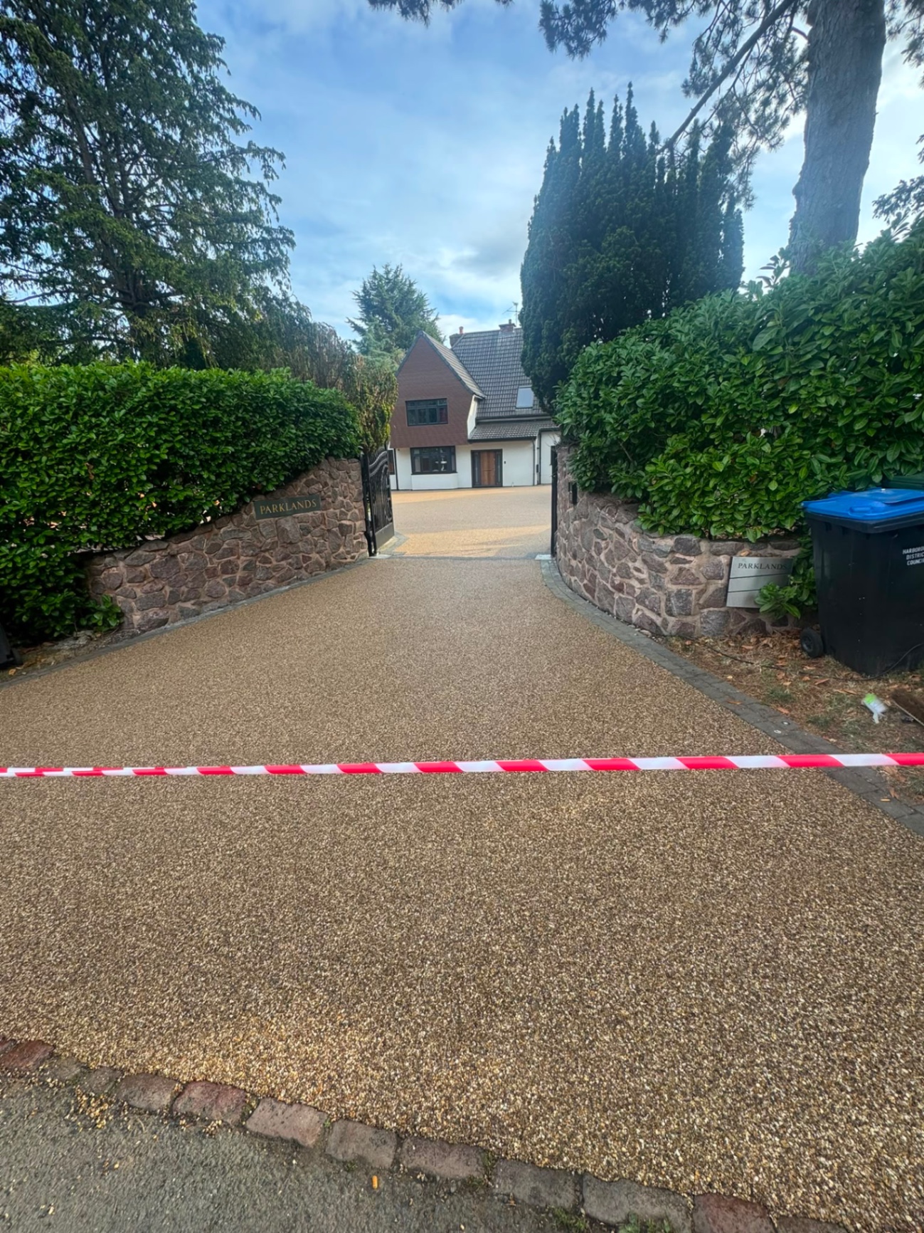 Resin bound driveway entrance apron taken right out to the kerb line, Gloucester